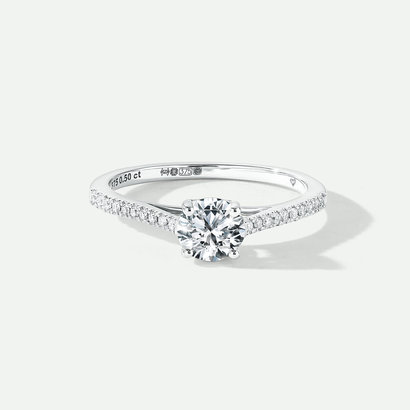Lab Grown Diamond Solitaire engagement ring with diamond set shoulders