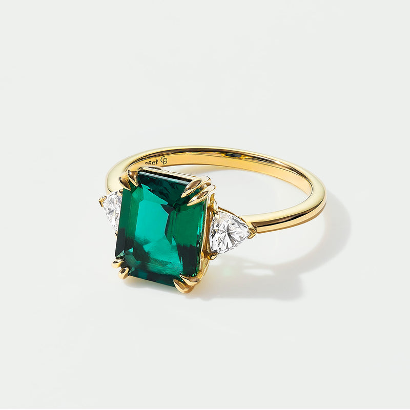 Cassie | 9ct Yellow Gold Created Emerald and 0.36ct tw Trillion Cut Lab Grown Diamond Engagement Ring