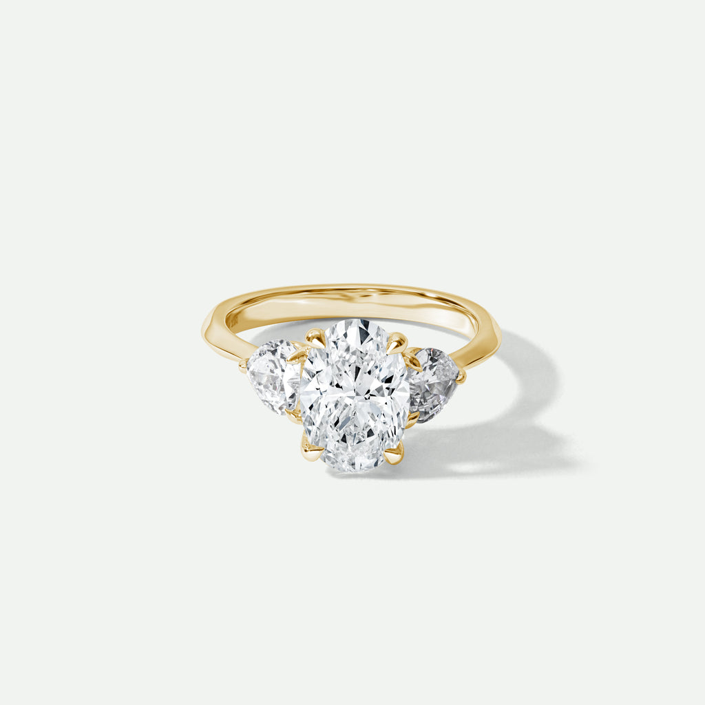 #Texas | 18ct Yellow Gold 3.00ct tw Oval and Hearts Lab Grown Diamond Trilogy Ring